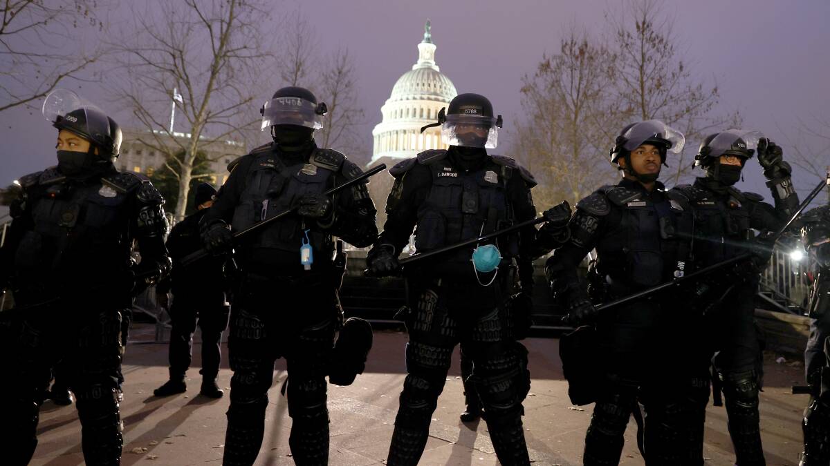 Police in riot gear outside the Capitol building. Picture: Getty Images