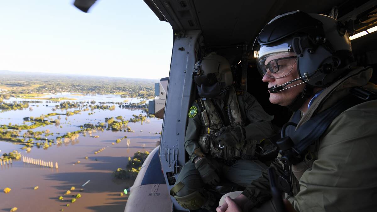 The NSW floods represented some rare political safe ground for Scott Morrison this week. Picture: Getty Images