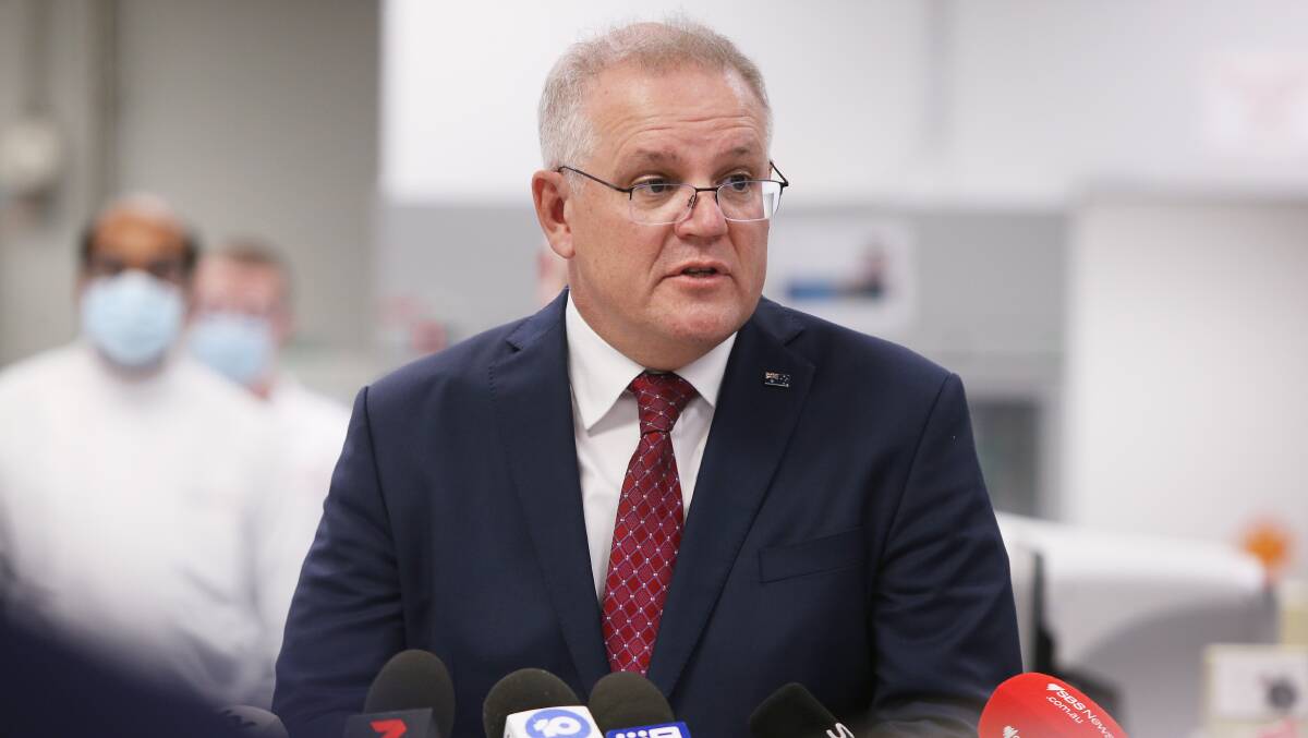 Prime Minister Scott Morrison addresses the media during a visit to an AstraZeneca facility in August last year. Picture: Getty Images