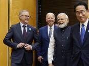 Prime Minister Anthony Albanese, left, is all smiles as he joins the leaders of the United States, India and Japan at the Quad meeting. Picture: AAP