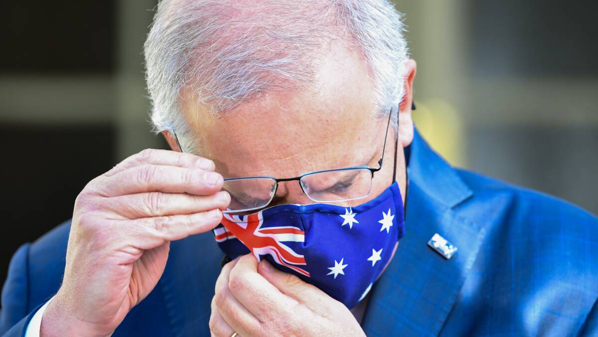 As many in our nation begged for the return of mask mandates to stop the spread of the wildly infectious Omicron variant, Scott Morrison said no. Picture: Getty Images