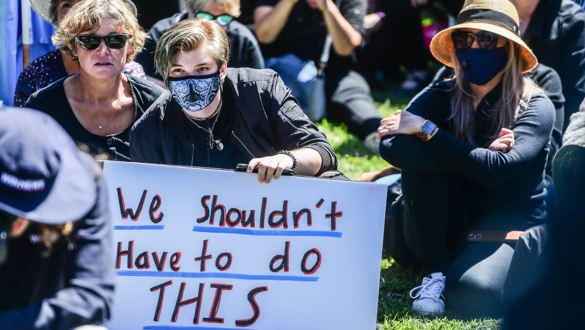 The March 4 Justice protesters outside Parliament House in Canberra had a pointed message. Picture: Karleen Minney
