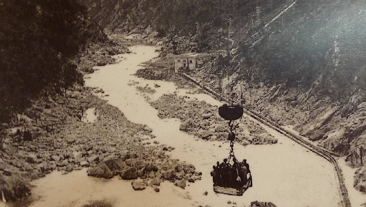 The flying fox used to ferry workers' materials from one side of the gorge to the other during construction of Burrinjuck Dam circa 1910. Picture: Yass and District Historical Society Inc