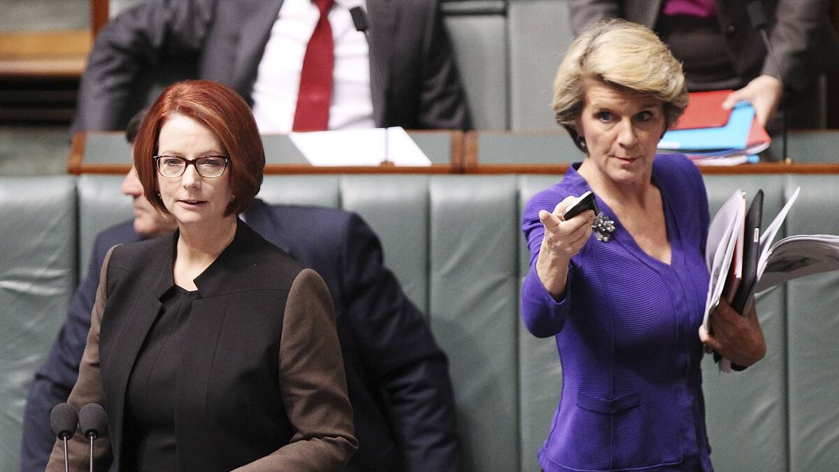 Then-prime minister Julia Gillard and then-deputy Liberal leader Julie Bishop in the House of Representatives in 2013. Picture: Getty Images