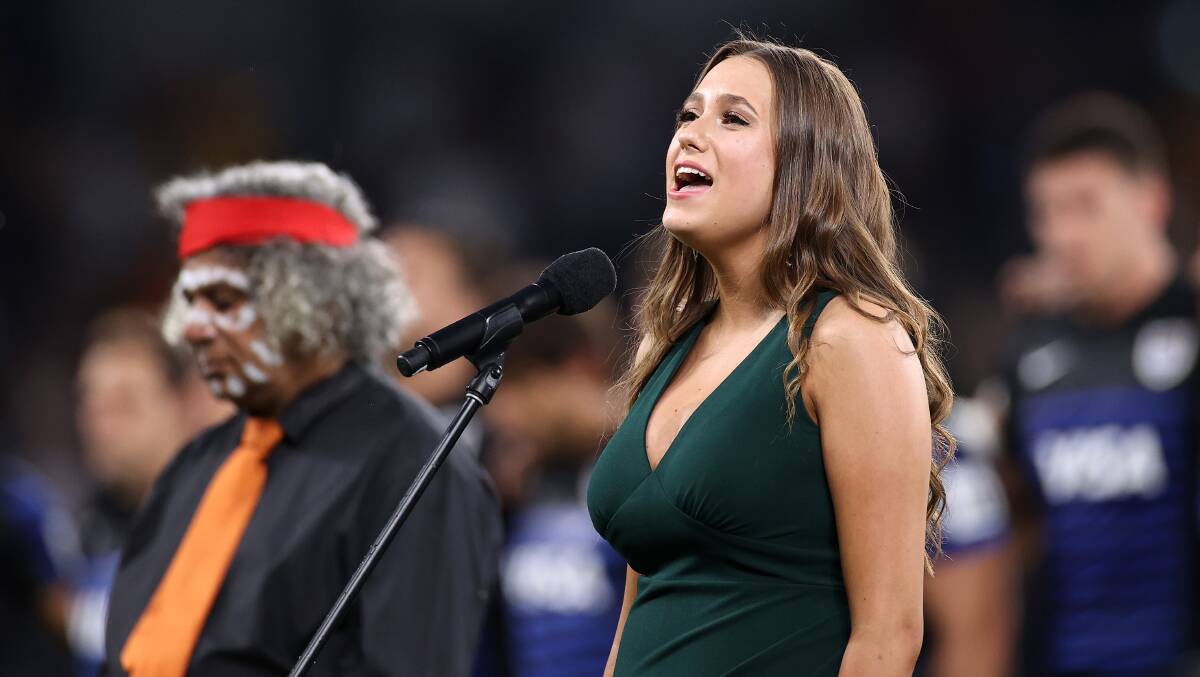 Olivia Fox sings Advance Australia Fair during the 2020 Tri Nations match between the Wallabies and Argentina in December. Picture: Getty Images