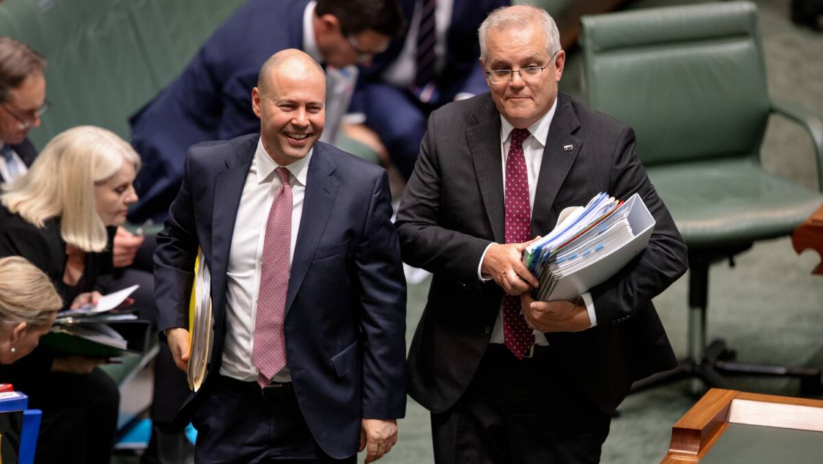 Treasurer Josh Frydenberg and Prime Minister Scott Morrison after the conclusion of question time the day after the federal budget. Picture: Sitthixay Ditthavong