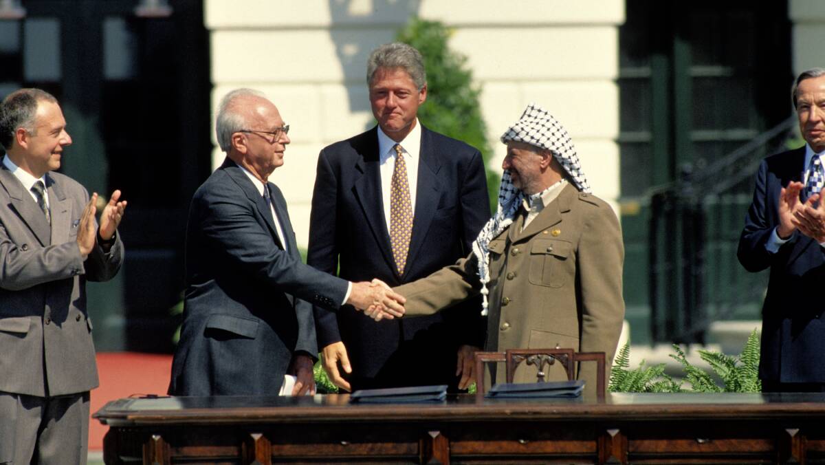 Israeli Prime Minister Yitzhak Rabin (left) with US president Bill Clinton and PLO chairman Yasser Arafat. Picture: Mark Reinstein