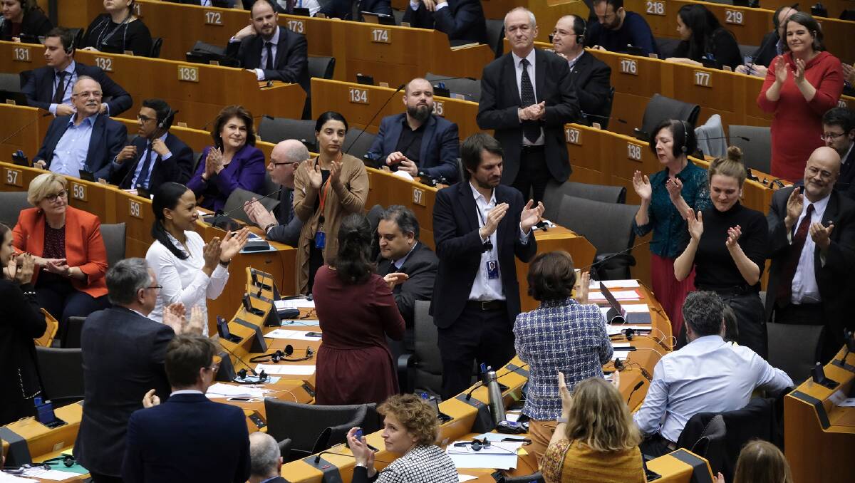 Members of the European Parliament react after the ratification of the Brexit deal in Brussels on Wednesday. Picture: Shutterstock