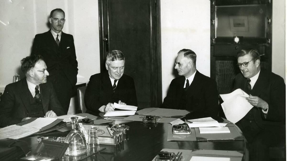 Prime Minister John Curtin (second from right) at the War Council table in Melbourne in 1941. Picture: Getty Images