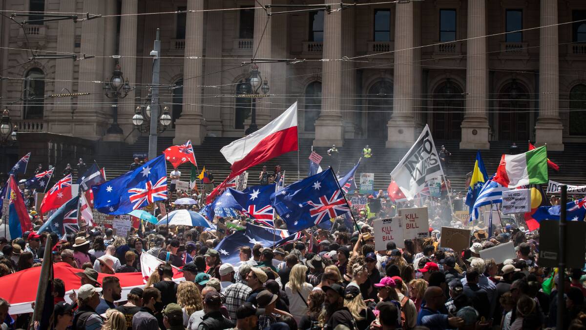 Protesters gathered on the steps of Victoria's Parliament House on November 27 to protest against mandatory vaccination. Picture: Getty Images