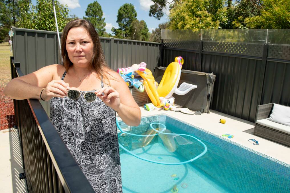 Angela Jacobsen had her face bitten while in her Rutherglen pool on Tuesday and believes he sunglasses saved her life. Picture by Tara Trewhella
