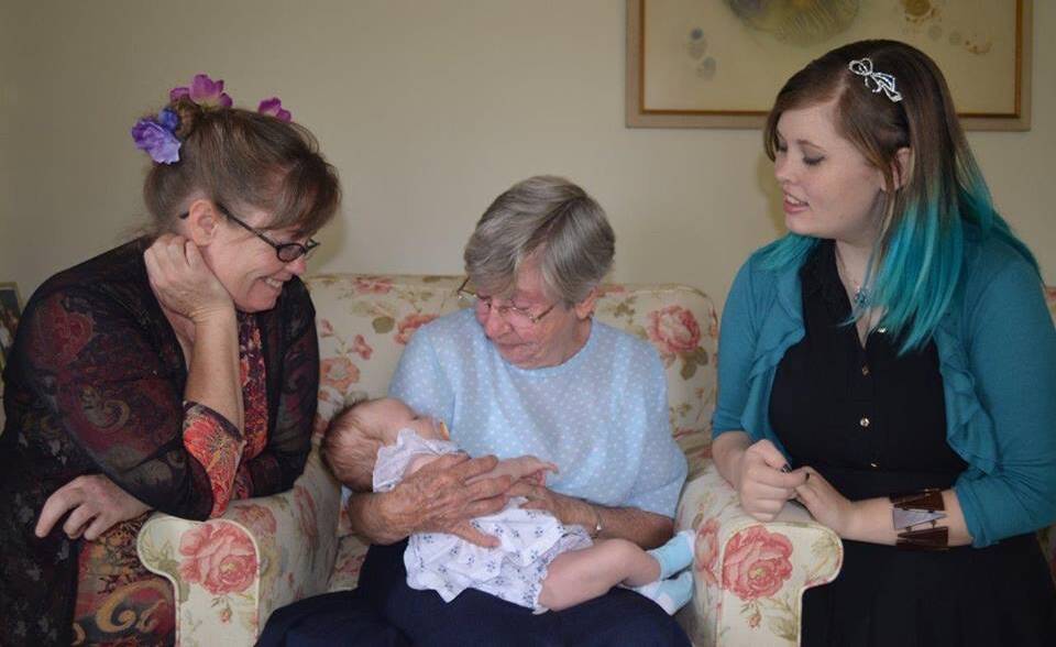 Nicola Fisher, left, died while in the care of Canberra Hospital. From L-R, Nicola Fisher, her mother Barbara Fisher holding Nicolas first grandchild Miyuki Smith and Nicolas daughter/Miyukis mother, Freyja Smith.