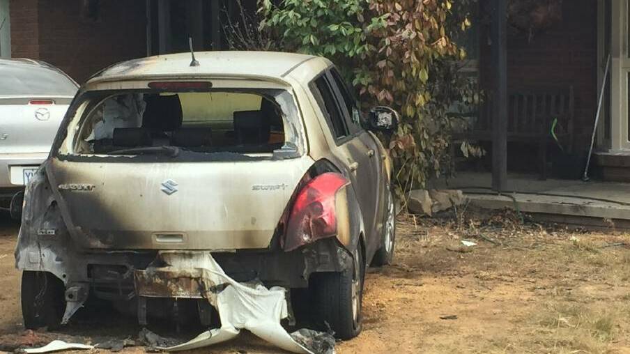 The torched Suzuki Swift. Picture: Andrew Brown