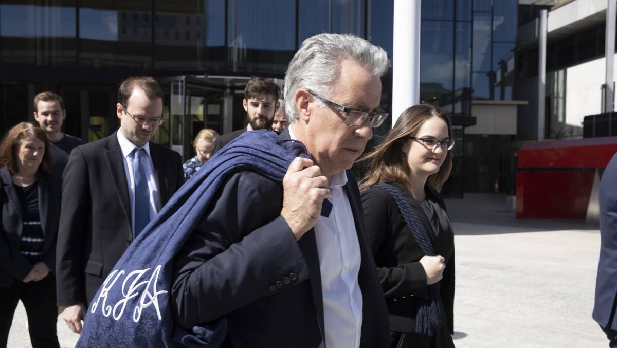 Barristers Ken Archer and Beth Morrisroe leave court on Friday. Photo: Sitthixay Ditthavong