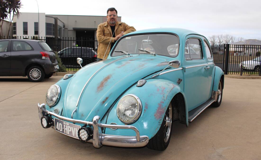 BYE BYE BEETLE: Bill Parianos with his beloved Volkswagen Beetle, a car with a cult following worldwide. Photo: Max Stainkamph 