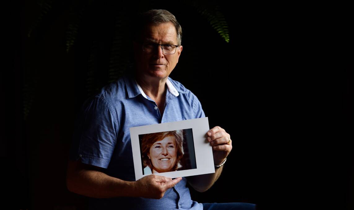 'You would never get a nicer person. She was soft spoken, just absolutely beautiful', Lyn Dawson's brother Greg Simms says. He is holding a picture of his sister Lynnette. Picture by Jonathan Carroll
