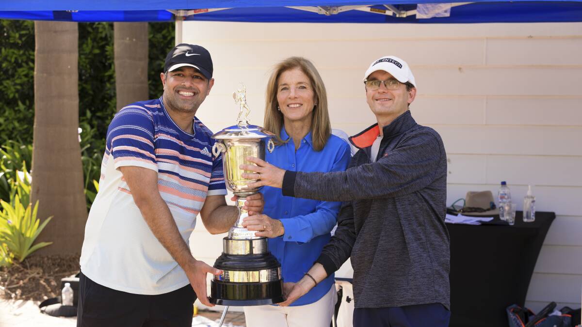 US Ambassador Caroline Kennedy presents the trophy to Hashem Abdal and Dario Polski. Picture by Keegan Carroll