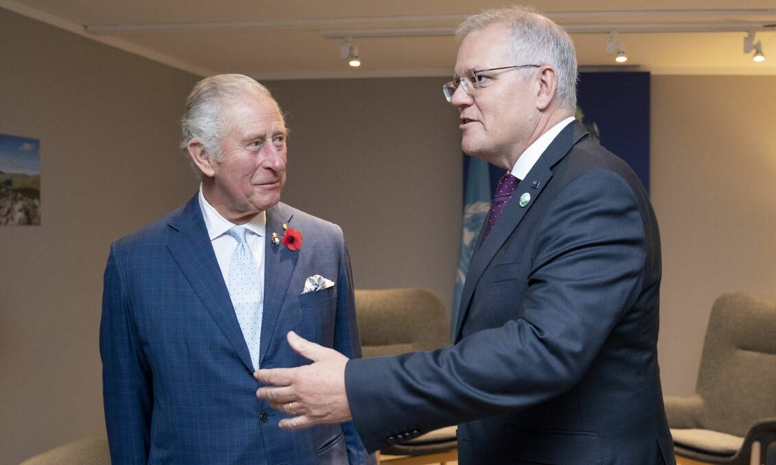 Prime Minister Scott Morrison and Prince Charles meet on the sidelines of the Glasgow climate summit. Picture: Getty Images 