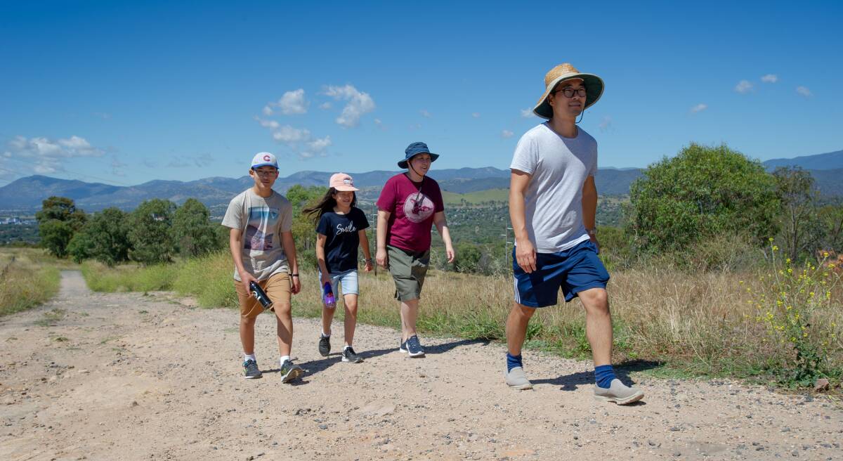 Oren, Phoebe, Hannah and John Cho of Wanniassa regularly make their way up Mount Taylor. Picture: Elesa Kurtz