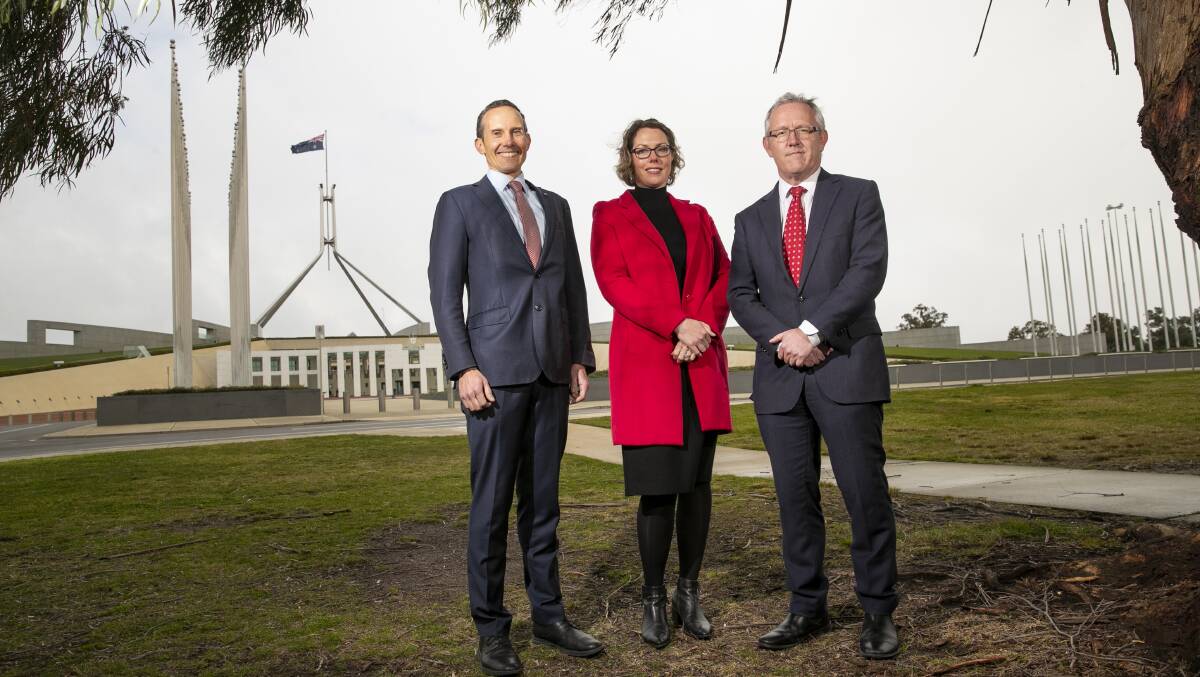 ACT Labor members Andrew Leigh, Alicia Payne and David Smith outside Parliament House. Picture: Keegan Carroll