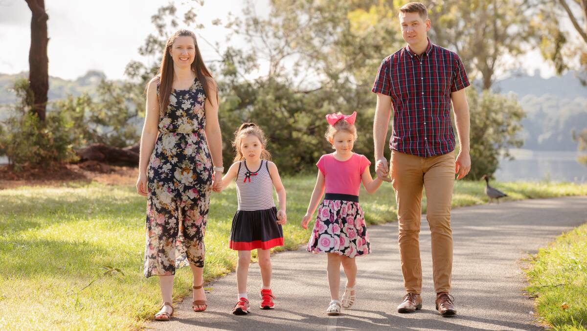 Belinda and Hugh Clifford fear for their daughter's future after her therapy funding was cut. Picture: Sitthixay Ditthavong