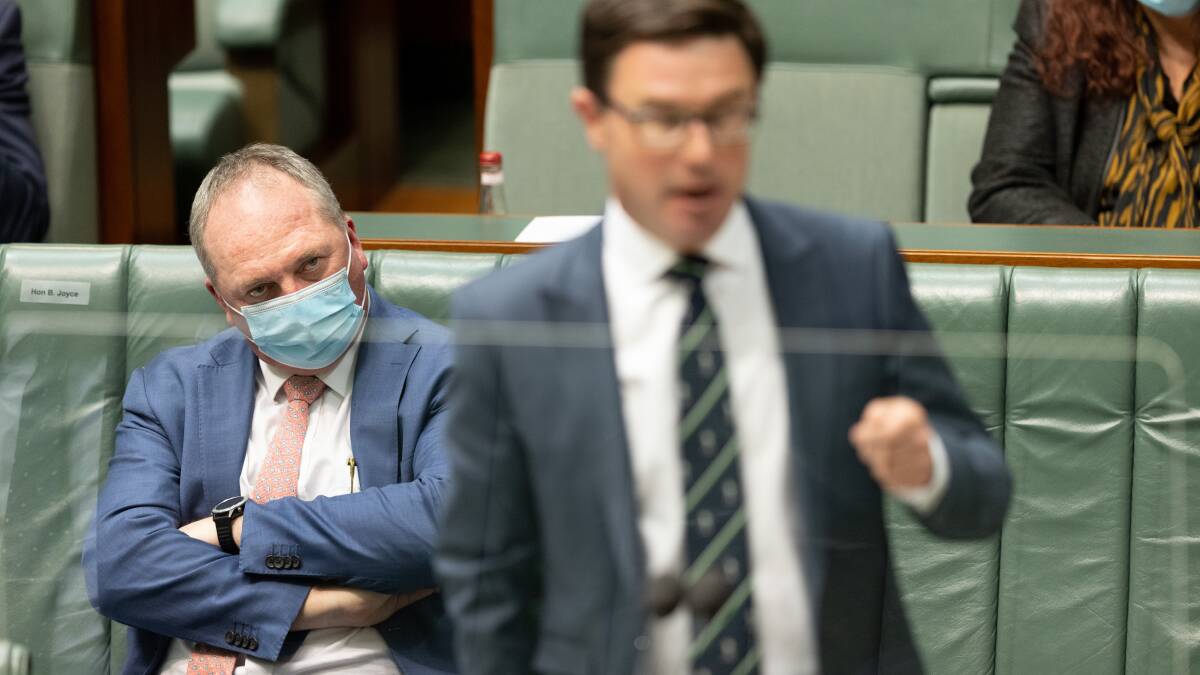 Barnaby Joyce, pictured while still Nationals leader, watches David Littleproud speak in Parliament. Picture: Sitthixay Ditthavong