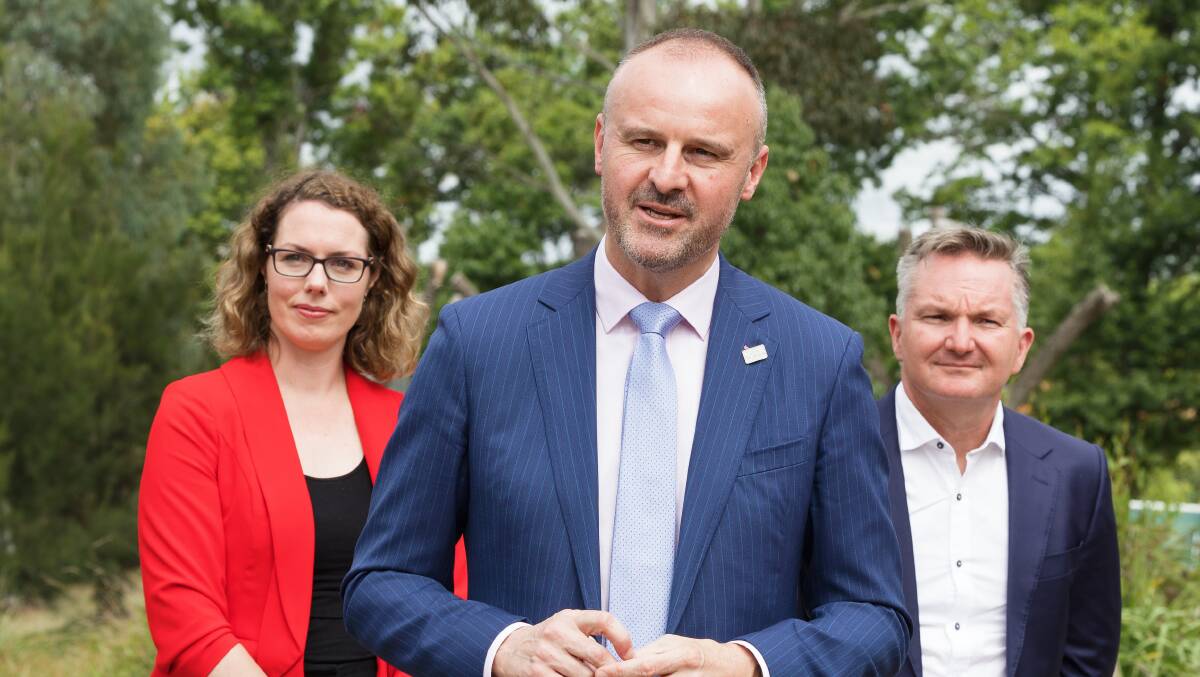 Chief Minister Andrew Barr, joined his federal colleagues Alicia Payne and Chris Bowen as they announced a commitment to build community batteries in three Canberra suburbs if Labor wins the election. Picture: Sitthixay Ditthavong