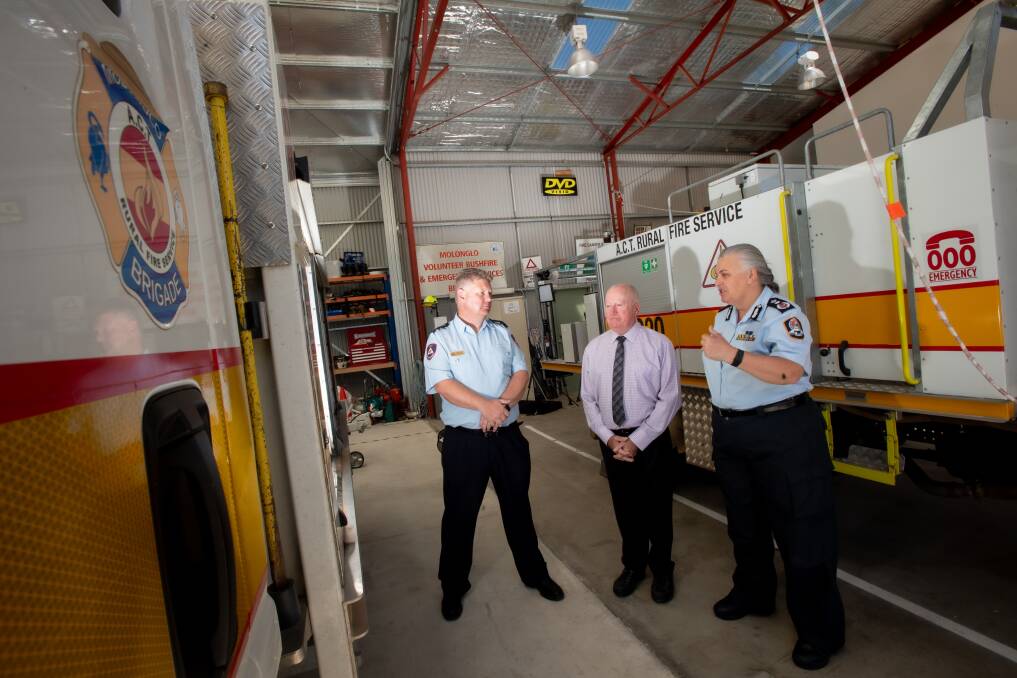 ACT Emergency Services Minister Mick Gentleman and ESA commissioner Georgeina Whelan (right) announce the newly-appointed ACT Rural Fire Service chief officer Rohan Scott (left). Picture: Karleen Minney