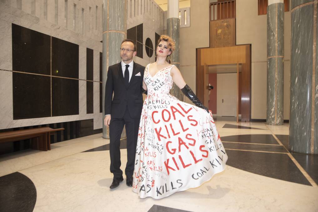 Adam Bandt, pictured with his wife Claudia Perkins at the Midwinter Ball, will push the government to stop allowing new coal and gas projects. Picture by Keegan Carroll