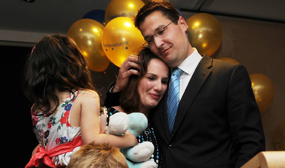 The then ACT opposition leader with his wife and children on election night in 2012. The Liberals would win the primary vote, but fall one seat short of forming government. Picture: Colleen Petch