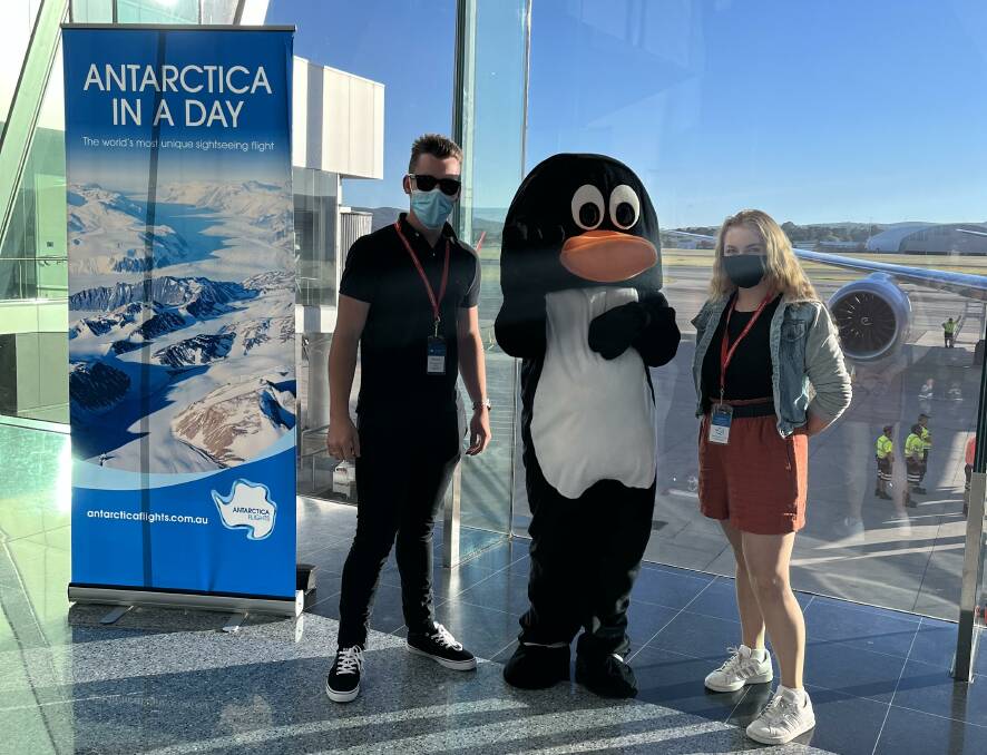 Kevan Brown and his partner Hayley Carne about to board a flight over Antarctica. Picture: Supplied 