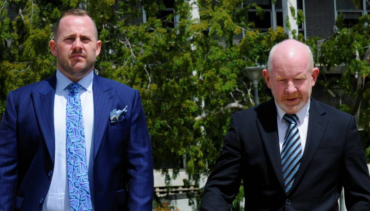 Stephen Mitchell, right, outside court on a previous occasion with defence lawyer Peter Woodhouse. Picture by Blake Foden 