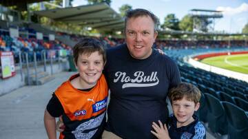 Clinton Fennamore with his sons Logan, 12, and Cameron, 8, of Queanbeyan.