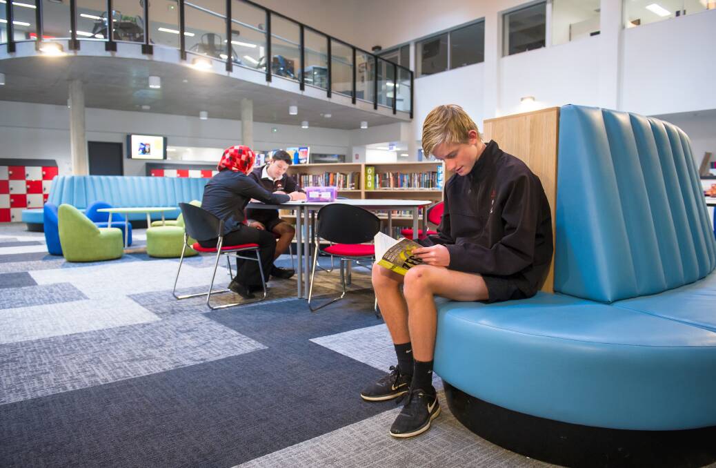 Belconnen High School was remodelled in 2019. Then year 10 students Malek Elfeky, Isaak Lyons and Campbell Marris in the school new learning commons. Picture by Elesa Kurtz