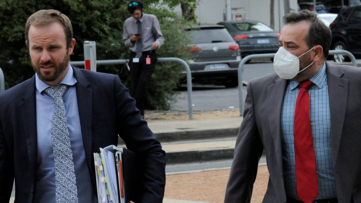 Tarek Elgayar, right, outside court with lawyer Jacob Robertson. Picture: Blake Foden