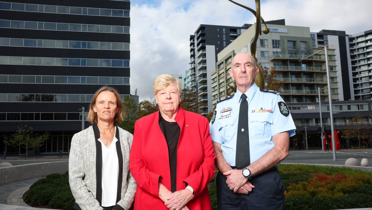 ACT domestic violence and sexual violence coordinator-general Kirsty Windeyer Victorian police chief commissioner Christine Nixon, who were both on the oversight committee, and ACT chief police officer Scott Lee. Picture by Sitthixay Ditthavong