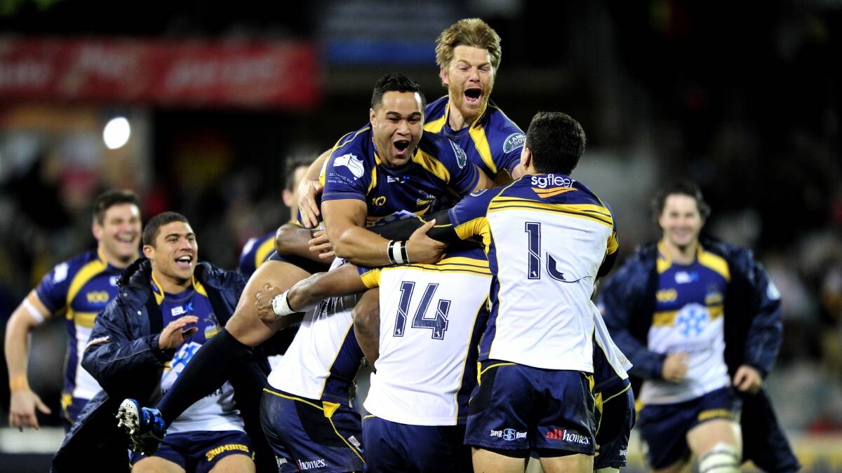 The Brumbies celebrate their shock victory over the British and Irish Lions in 2013. Picture by Melissa Adams