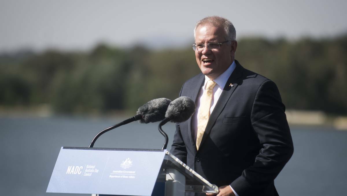 Prime Minister Scott Morrison at an Australia Day flag raising and citizenship ceremony in 2019. Picture: Dion Georgopoulos
