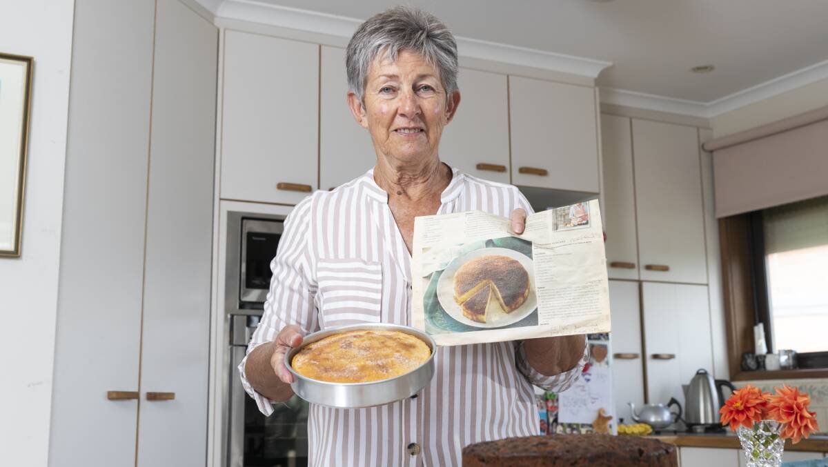 Merran Hunter with her tea cake and the recipe she uses from Food & Wine. Picture: Keegan Carroll